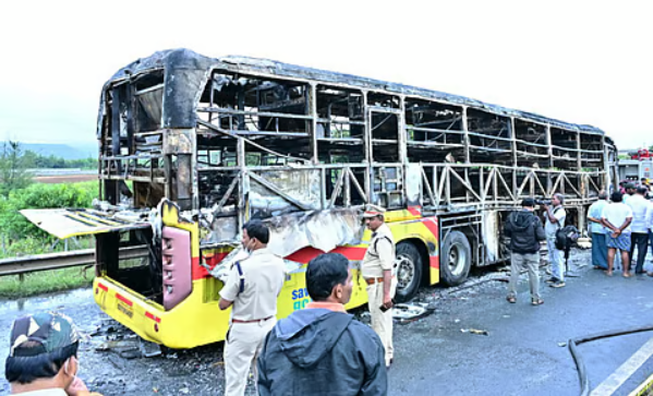 Firefighters working at the Andhra Pradesh bus fire accident site
